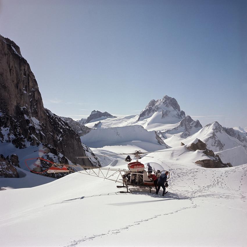 Old helicopter landed on a glacier